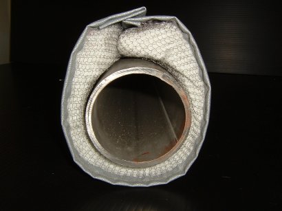 Removable thermal blanket for engine components such as mufflers and turbo chargers